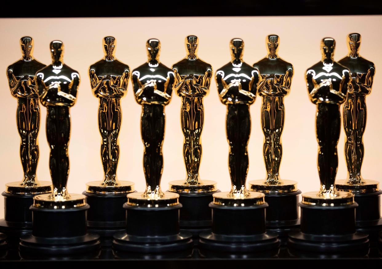 Oscar trophies are prepared backstage during the 94th Academy Awards at the Dolby Theatre.