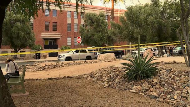 PHOTO: In this screen grab from a video, police tape crosses the scene where a person was killed on the University of Arizona campus in Tucson, Ariz. (KGUN)
