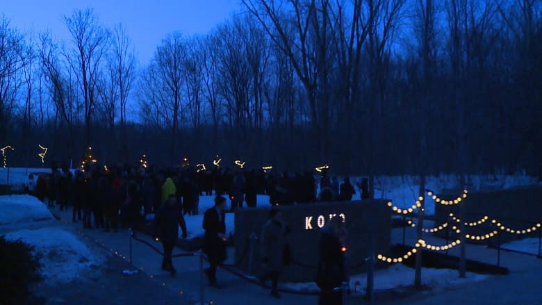 Family, friends say goodbye to Matthew Schreindorfer during candlelight ceremony