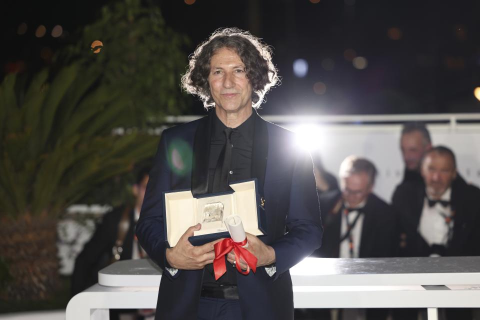 Jonathan Glazer, winner of the jury prize award for the film 'The Zone of Interest', poses for photographers during a photo call following the awards ceremony at the 76th international film festival, Cannes, southern France, Saturday, May 27, 2023. (Photo by Vianney Le Caer/Invision/AP)