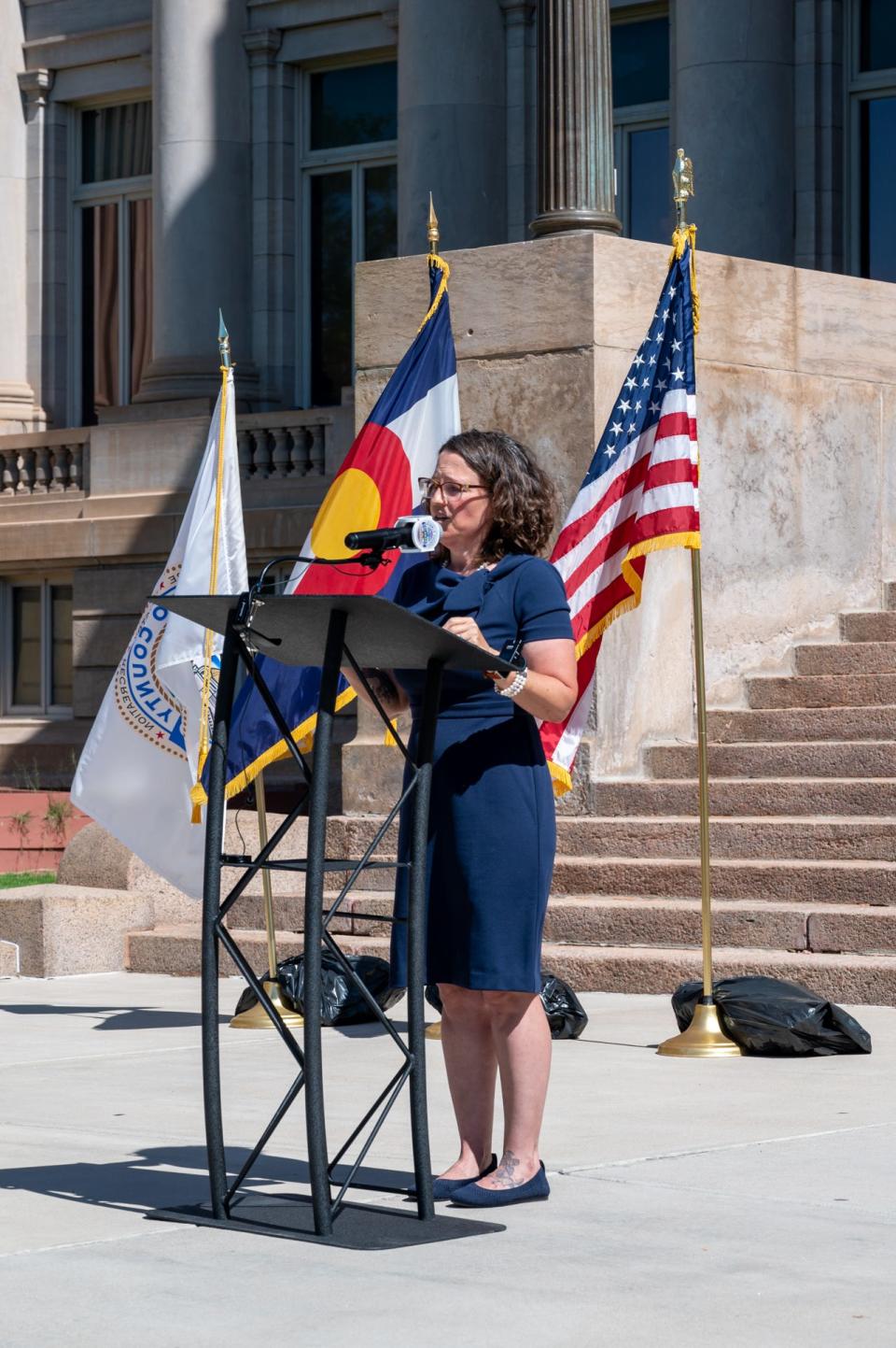 Pueblo County Commissioner Daneya Esgar delivers remarks after being sworn in outside the historic county courthouse on June 1, 2023.