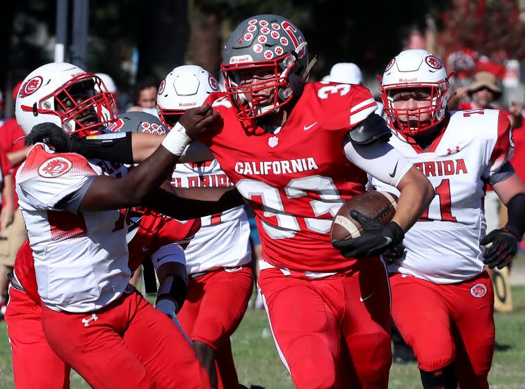 RIVERSIDE, CALIF. - SEPT. 24, 2022. California School For The Deaf - Riverside running back Cody Metzner rumbles through the defense of the Florida School For The Deaf and Blind on Saturday, Sept. 24, 2022, in Riverside. The. Cubs won, 84-8, and kept their record perfect at 5-0. (Luis Sinco / Los Angeles Times)