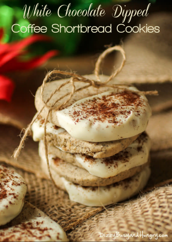 <p>Dizzy Busy And Hungry</p><p>Delicious, elegant holiday shortbread cookies made with real coffee, dipped in white chocolate, and dusted with instant coffee powder! Get the recipe: <a href="http://www.dizzybusyandhungry.com/coffee-shortbread-cookies/" rel="nofollow noopener" target="_blank" data-ylk="slk:White-Chocolate Dipped Coffee Shortbread;elm:context_link;itc:0;sec:content-canvas" class="link rapid-noclick-resp"><strong>White-Chocolate Dipped Coffee Shortbread</strong></a></p>