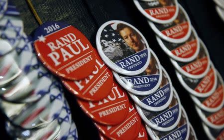 Campaign buttons for U.S. Senator Rand Paul (R-KY) are pictued at an event where Paul formally announced his candidacy for president in Louisville, Kentucky, April 7, 2015. REUTERS/Aaron P. Bernstein