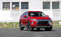 <p>Mitsubishi's newest small SUV in the U.S. is the <a href="https://www.caranddriver.com/mitsubishi/eclipse-cross" rel="nofollow noopener" target="_blank" data-ylk="slk:Eclipse Cross;elm:context_link;itc:0;sec:content-canvas" class="link ">Eclipse Cross</a>, which revives an iconic name once affixed to the brand's Eclipse sport coupe. The Eclipse Cross is not, as you can see, a "coupe" in the traditional sense, but it tries to achieve the spicier visual drama of other "crossover coupes" on the market, with a faster roofline than the otherwise similar Outlander Sport. That raked tail contributes to the Mitsubishi's last-place showing among its compact competitors, however—the Eclipse Cross can only fit 17 carry-on bags. </p>