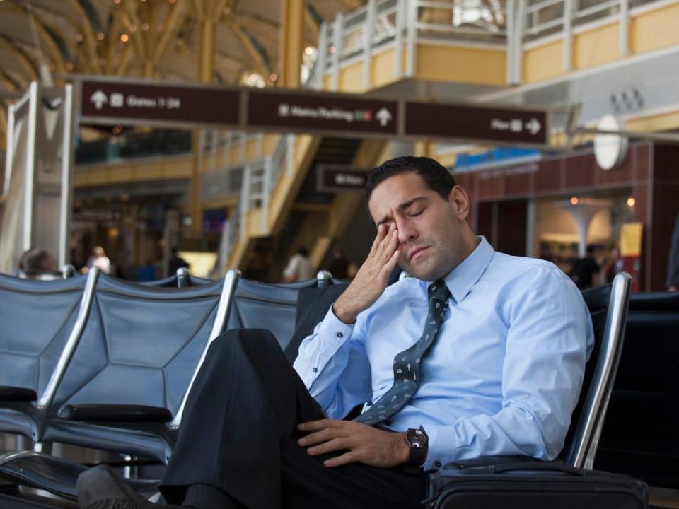 Airline passenger waiting in a departure lounge.