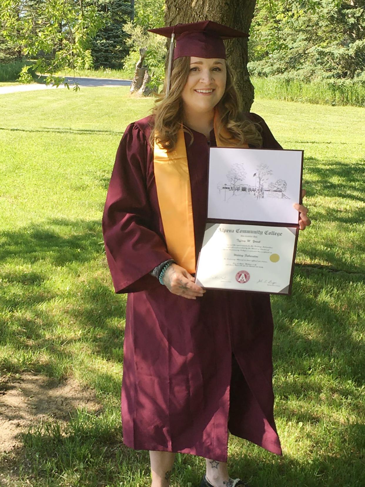 Tiffany Younk following her graduation in May 2020 from Alpena Community College where she graduated with a certificate in welding fabrication.