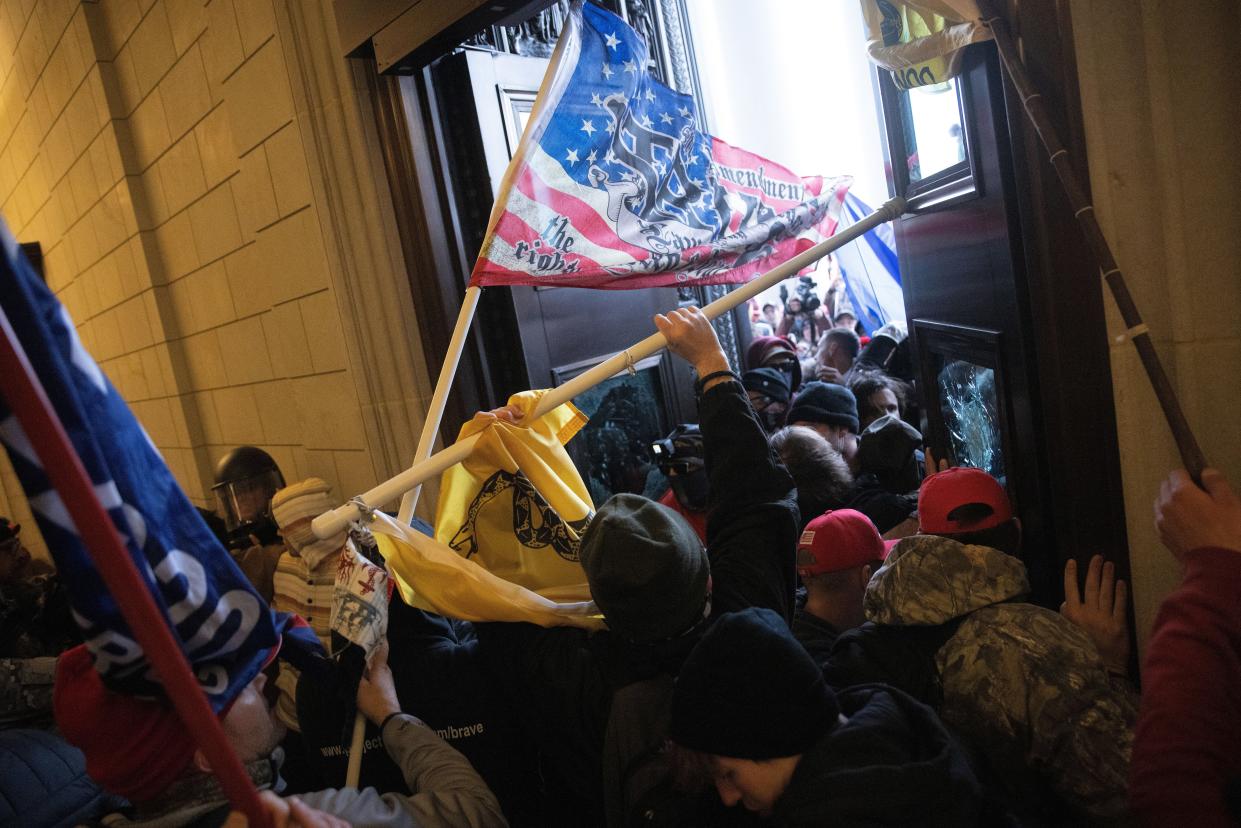 A pro-Trump mob breaks into the U.S. Capitol on January 6, 2021 in Washington, DC. Congress held a joint session today to ratify President-elect Joe Biden's 306-232 Electoral College win over President Donald Trump.
