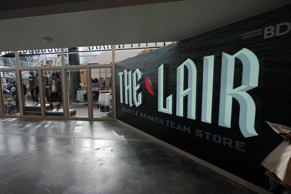 The Lair, the Seattle Kraken team store inside Climate Pledge Arena, is shown Wednesday, Oct. 20, 2021, during a media tour ahead of the NHL hockey team's home opener Saturday against the Vancouver Canucks in Seattle. The historic angled roof of the former KeyArena was preserved, but everything else inside the venue, which will also host concerts and be the home of the WNBA Seattle Storm basketball team, is brand new. (AP Photo/Ted S. Warren)