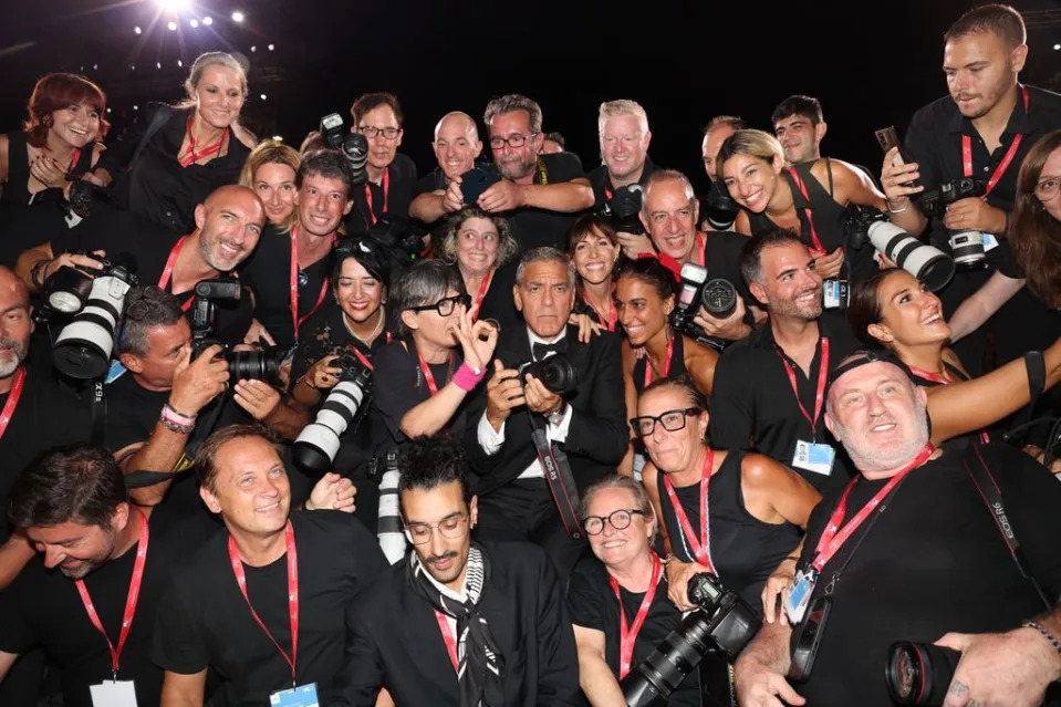 VENICE, ITALY - SEPTEMBER 01: George Cloney poses with photographers as he attends the 