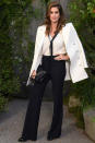 <p><strong>3 October</strong> Cindy Crawford attended the Chanel catwalk show wearing a chic monochrome outfit. </p>