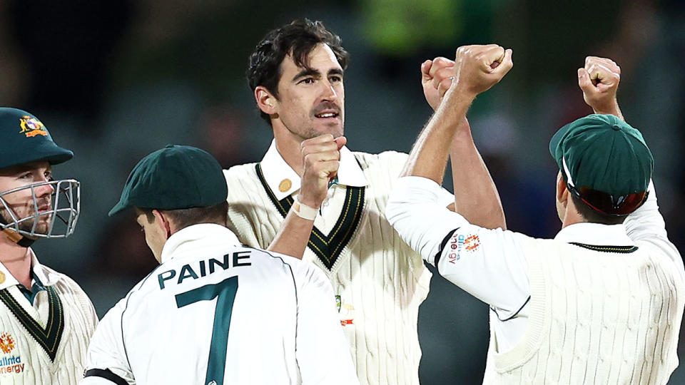 Mitchell Starc can be seen here celebrating with teammates during the first Test.