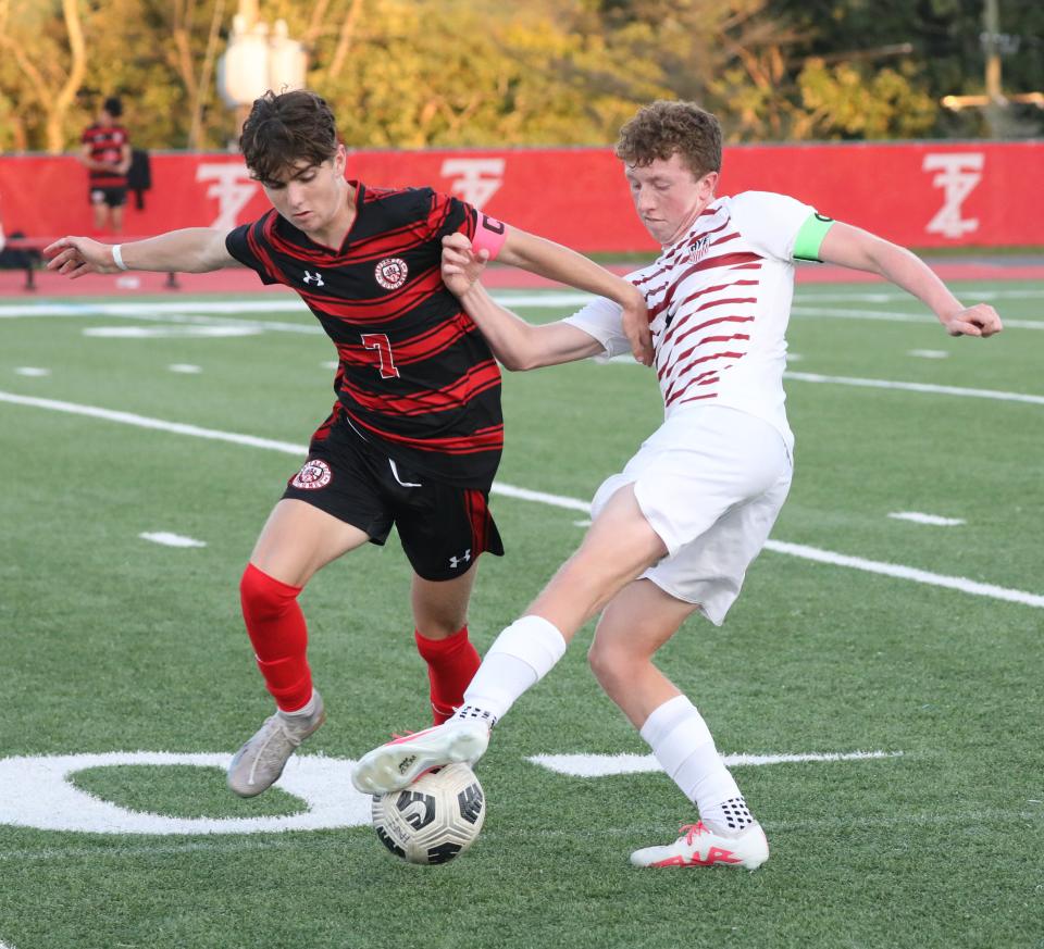 Tappan Zee's Ryan Shalvey and Rye's Ollie Lincoln battle for control during their boys soccer game at Tappan Zee High School, Sept. 19, 2023.