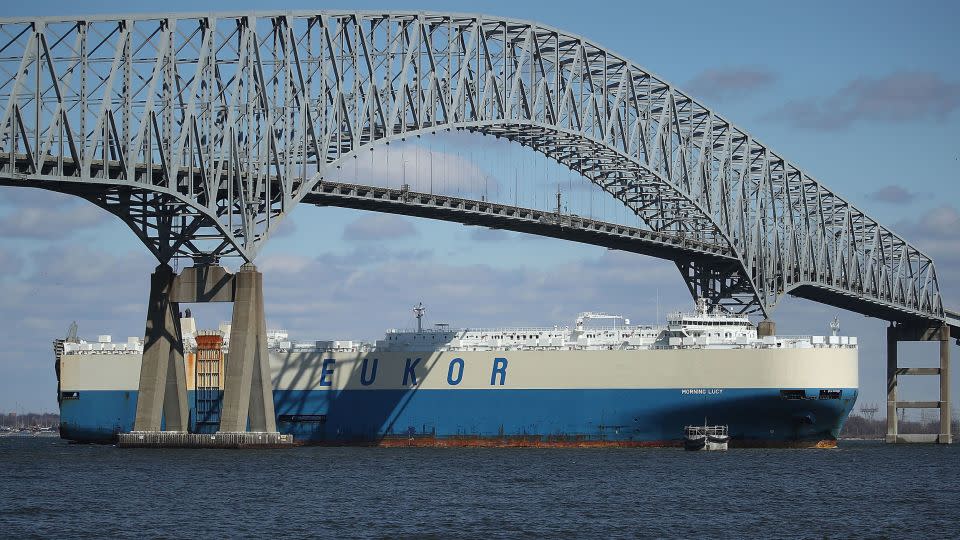 An outbound cargo ship passes under the Francis Scott Key Bridge, March 9, 2018 in Baltimore, Maryland. - Mark Wilson/Getty Images