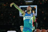 Milwaukee Bucks' Damian Lillard watches his shot during the 3-point contest at the NBA basketball All-Star weekend, Saturday, Feb. 17, 2024, in Indianapolis. (AP Photo/Darron Cummings)