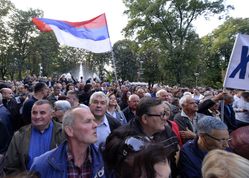People protest against alleged election fraud in a general elections in the Bosnian town of Banja Luka, 240 kms northwest of Sarajevo, Thursday, Oct. 6, 2022. Opposition parties asking to open the bags and recount the votes for the President of Republika Srpska. (AP Photo/Radivoje Pavicic)