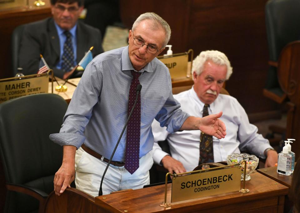 FILE - South Dakota state Sen. Lee Schoenbeck asks a question of the defense during the impeachment trial of Attorney General Jason Ravnsborg on June 21, 2022, at the South Dakota state Capitol in Pierre, S.D. South Dakota lawmakers can adorn their office with a crucifix, but they cannot pound the nail into the state Capitol's wall, a legislative oversight board clarified on Tuesday, Dec. 6, as part of a policy regulating how religious symbols can mark the state's seat of government.