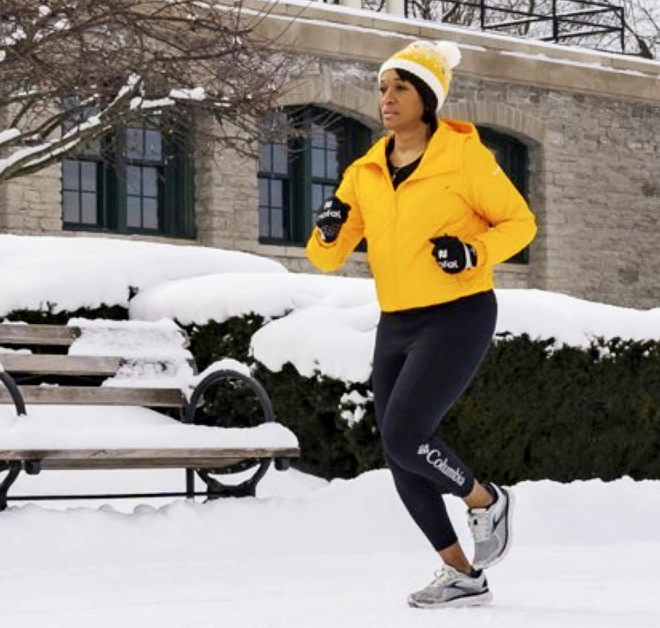 Image: Kim Backey running in Buffalo snow (Courtesy Will Holton)