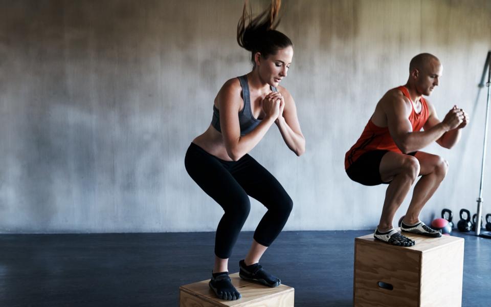 Man and woman working out