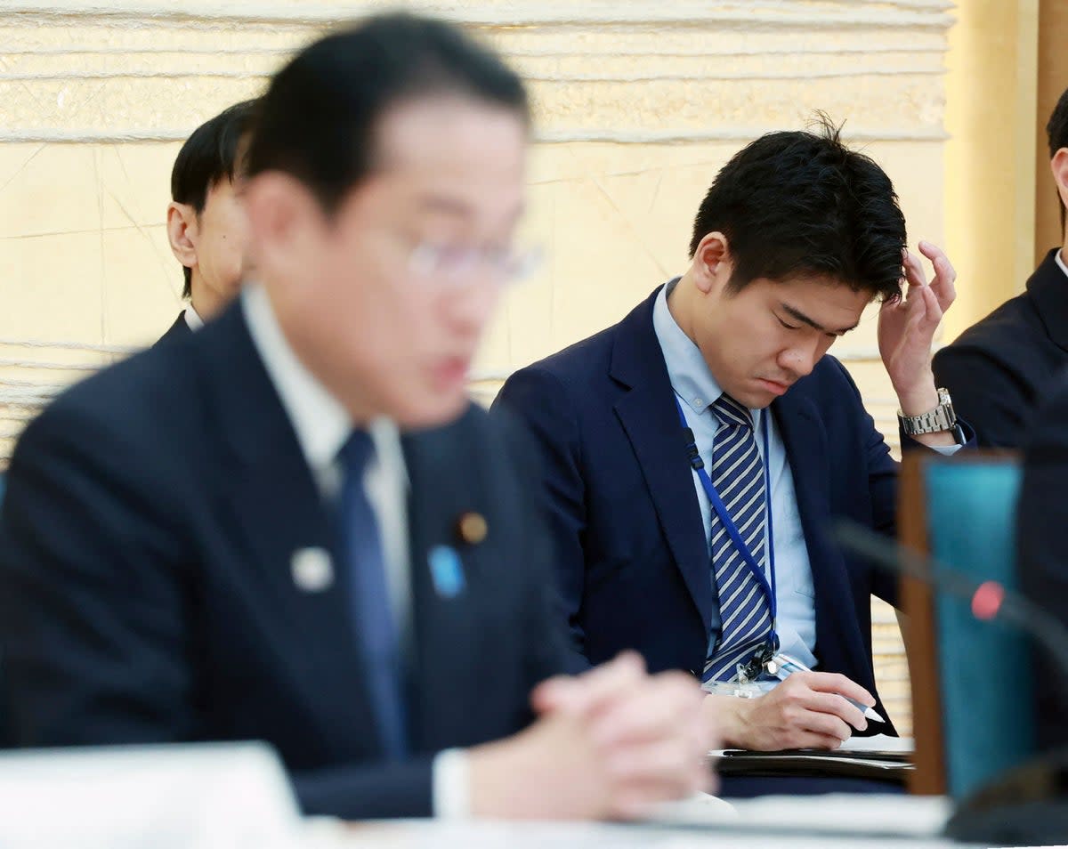 Shotaro Kishida (R), son of Japan’s prime minister Fumio Kishida, attending a meeting at the prime minister’s office (JIJI Press/AFP via Getty Images)