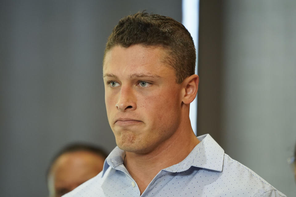 Former Northwestern football player Tom Carnifax speaks during a press conference addressing widespread hazing accusations at Northwestern University Wednesday, July 19, 2023, in Chicago. (AP Photo/Erin Hooley)