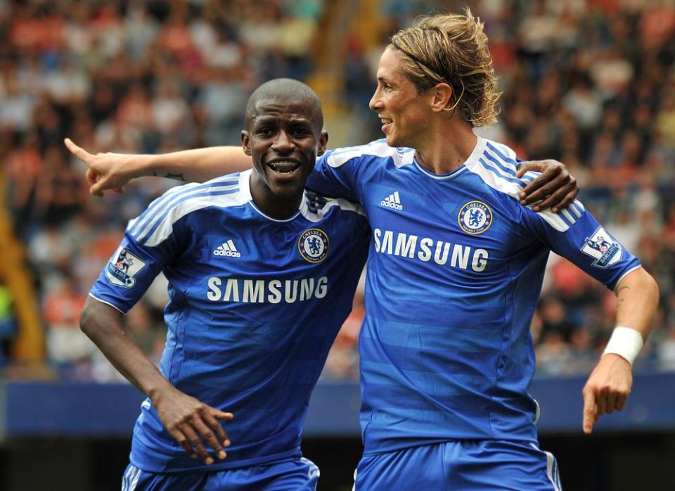 Ramires celebrates with Fernando Torres during Chelsea’s 4-1 win.