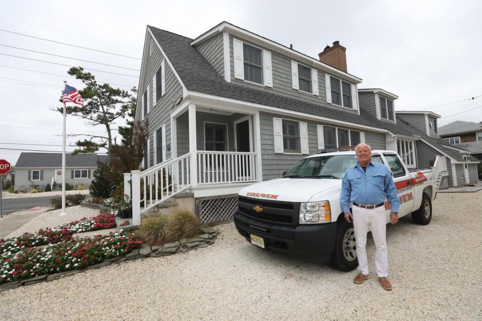 Mantoloking Office of Emergency Management Director Bob McIntyre in front of his home, that is one block from the beach and was damaged by Super Storm Sandy. Mantoloking was the hardest town hit by Super Storm Sandy in 2012. 