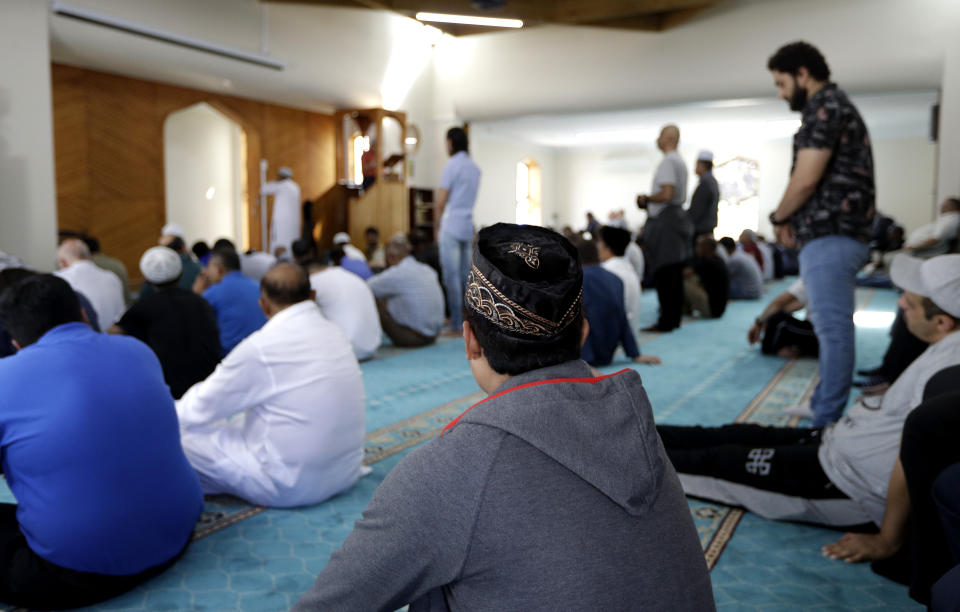 In this Friday, Feb. 28, 2020, photo, Muslims pray during Friday Prayers at the Al Noor mosque in Christchurch, New Zealand. New Zealanders on Sunday, March 15, 2020, will commemorate those who died on the first anniversary of the mass killing, as the tragedy continues to ripple through the community. Three people whose lives were forever altered that day say it has prompted changes in their career aspirations, living situations and in the way that others perceive them. (AP Photo/Mark Baker)