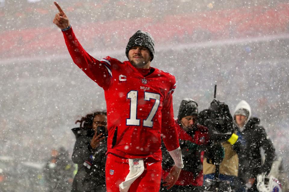 ORCHARD PARK, NEW YORK - DECEMBER 17: Josh Allen #17 of the Buffalo Bills runs off the field after defeating the Miami Dolphins at Highmark Stadium on December 17, 2022 in Orchard Park, New York. (Photo by Bryan M. Bennett/Getty Images)