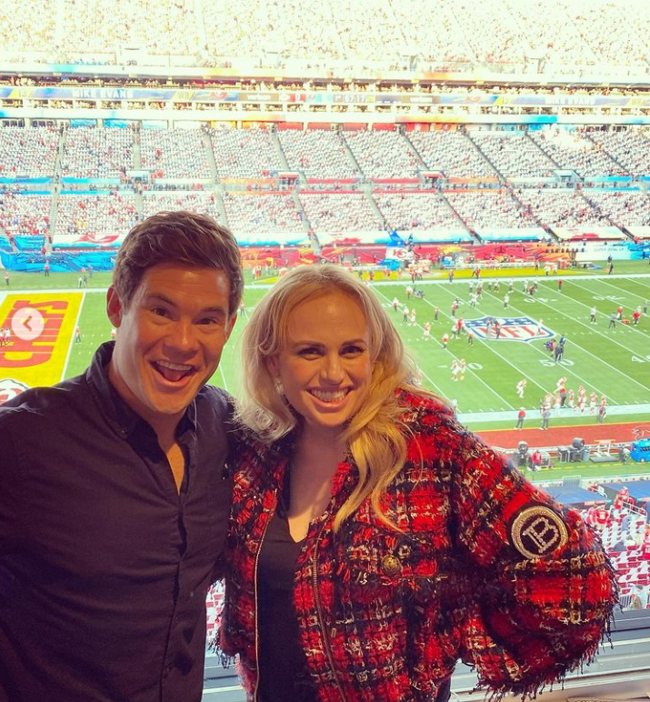 rebel wilson with work husband' Adam Devine at super bowl