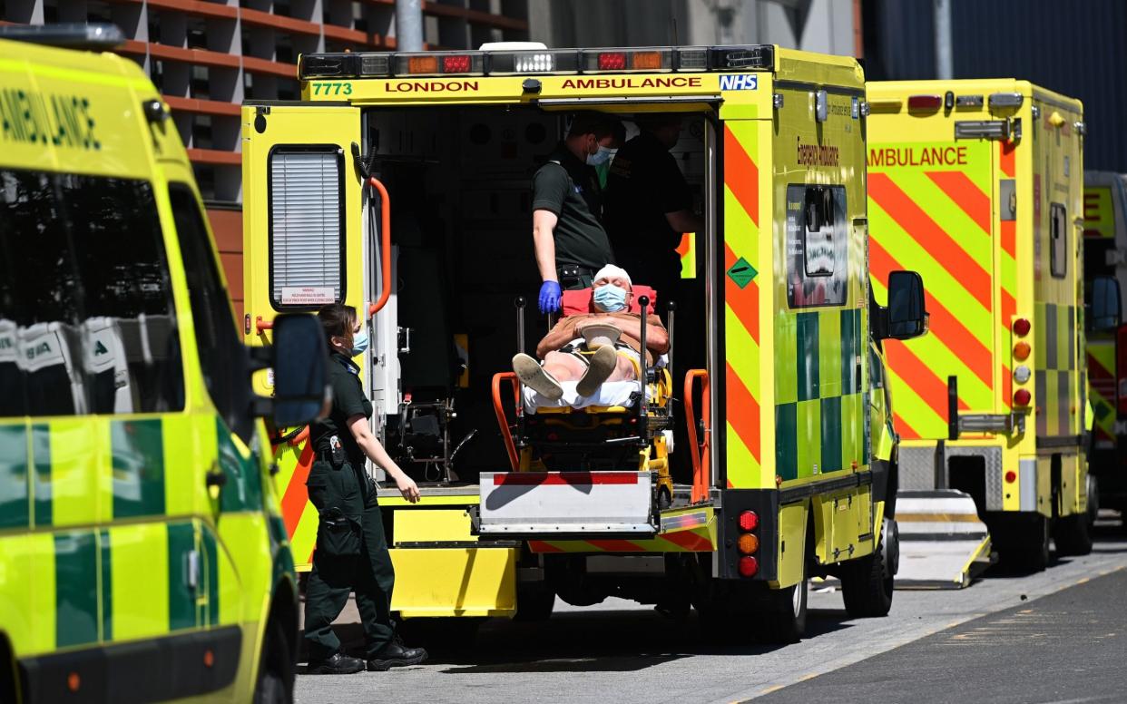 A patient is brought into the Royal London hospital in London - Shutterstock