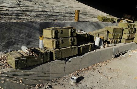 Military boxes are seen near Donetsk Sergey Prokofiev International Airport in a territory controlled by the self-proclaimed Donetsk People's Republic in Donetsk, eastern Ukraine, November 21, 2014. REUTERS/Antonio Bronic