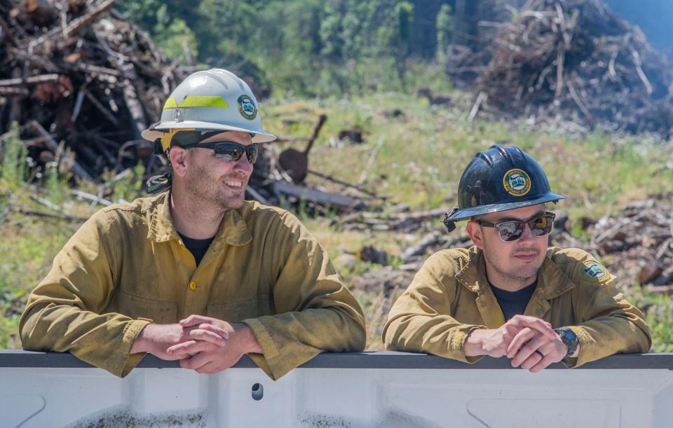 Walley Waibel, left, and Andrew Blanco observe the hundreds of wildland firefighters during their training on June 28.