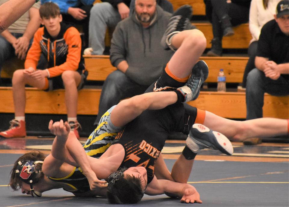 Central Valley Academy eighth-grader Jacob Hurd works to finish his 102-pound bout with Noah Becker from Mexico Academy at Section III's Class B tournament Saturday. Hurd won by major decision to claim an individual title.