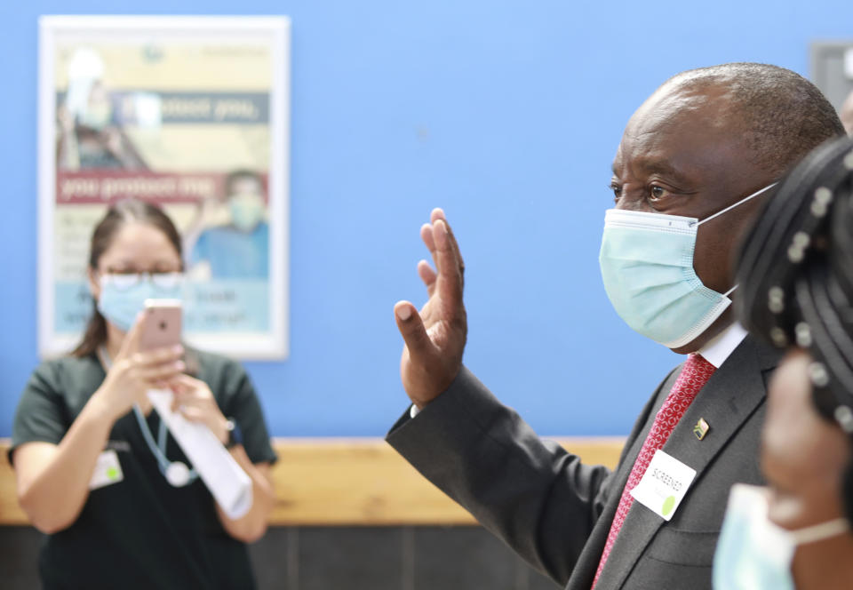 South African President Cyril Ramaphosa arrives at a hospital in Khayelitsha, Cape Town, South Africa Wednesday, Feb. 17, 2021, to receive a Johnson and Johnson vaccine. Ramaphosa was among the first in his country to receive the COVID-19 vaccination to launch the inoculation drive. (AP Photo/Nardus Engelbrecht)