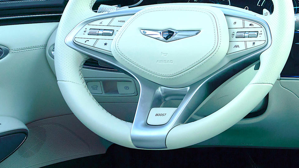 The steering wheel of the 2023 Genesis Electrified GV70.