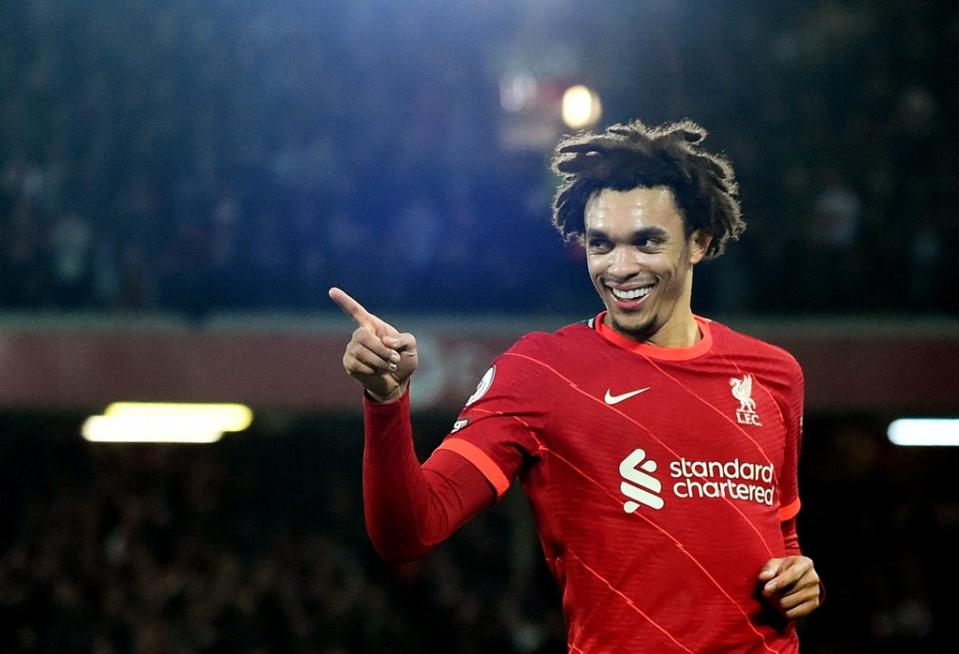 Trent Alexander-Arnold celebrates after scoring Liverpool’s third (Reuters)