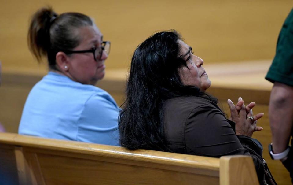 01/19/2022—Elizabeth Pantaleon, brown shirt, cries as she speaks with a victim’s advocate in court during the video first appearance the man who is charged with the murder of her husband. Ruben Gutierrez Pioquinto is facing murder charges after the Manatee County Sheriff’s Office says he shot a 33-year-old man dead and dumped his body by the side of the radon 77th Street East in Palmetto.