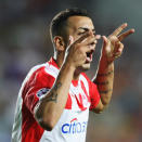 Nom: Kostas Mitroglou<br>Poste: Attaquant<br>Date de naissance (Âge): 12/03/1988 (24)<br>Numéro: 11<br>Club: Atromitos (Grèce GRE)