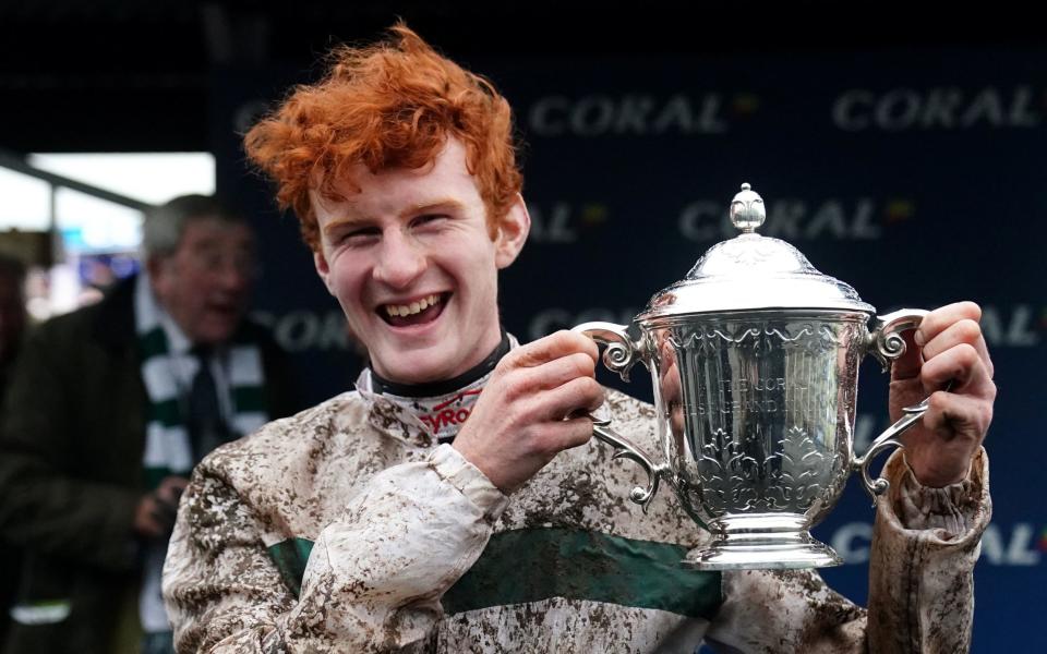 Jockey Caoilin Quinn celebrates the Welsh National win, the Irishman rode Nassalam to an impressive 34-lengths victory