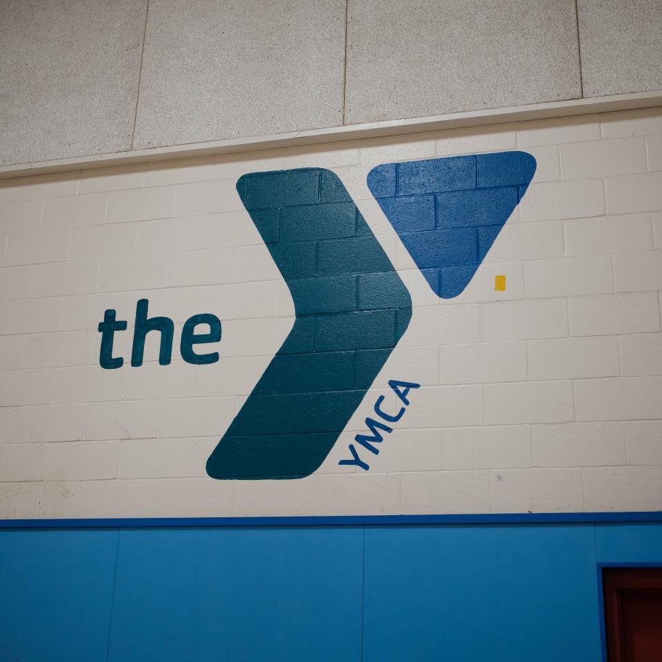 A view of the YMCA logo inside the gymnasium in Rome located at 301 W Bloomfield St. on Tuesday, November 22, 2022.