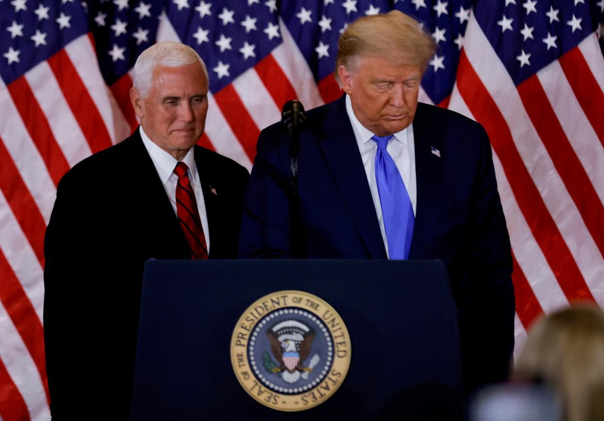 <p>File photo: US President Donald Trump and Vice President Mike Pence stand while making remarks about early results from the 2020 US presidential election</p> (REUTERS)