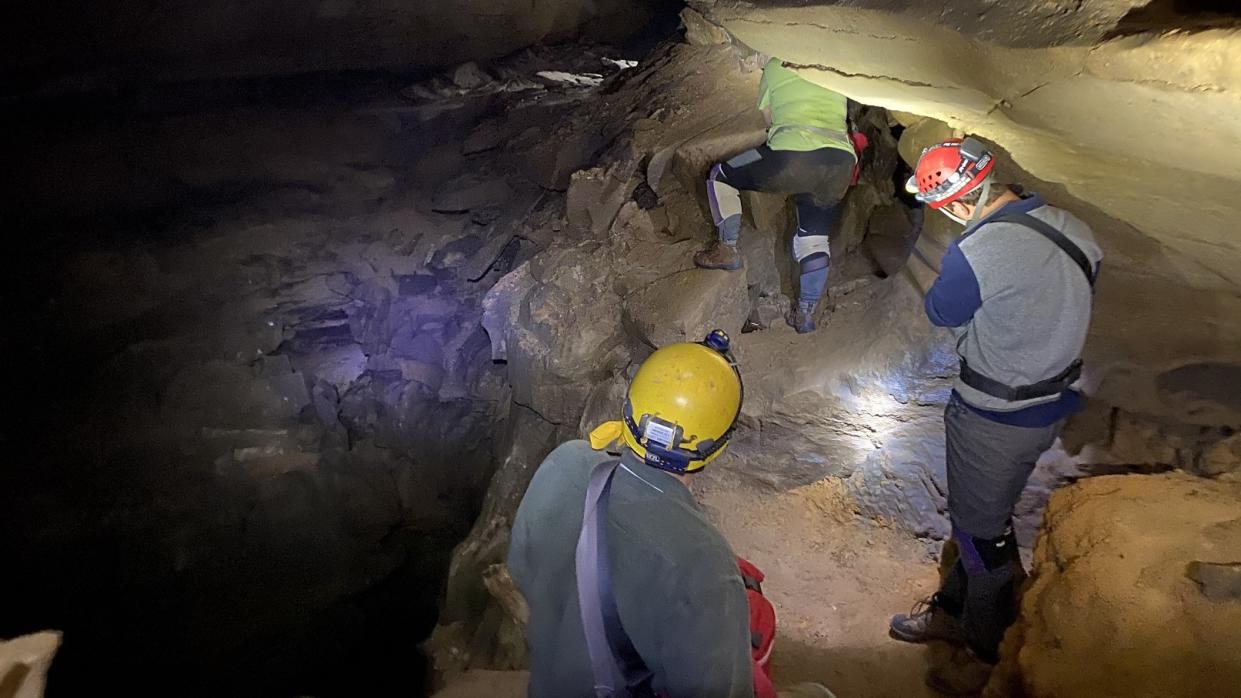  Paleontological Team crawls inside Mammoth Cave. 