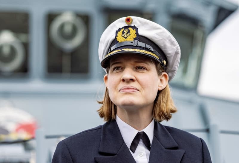 Frigate Captain Inka von Puttkamer stands on the deck of the minesweeper "Siegburg" after handing over command of the 3rd Minesweeper Squadron. Von Puttkamer is the first woman to take command of a German Navy combat unit. Axel Heimken/dpa
