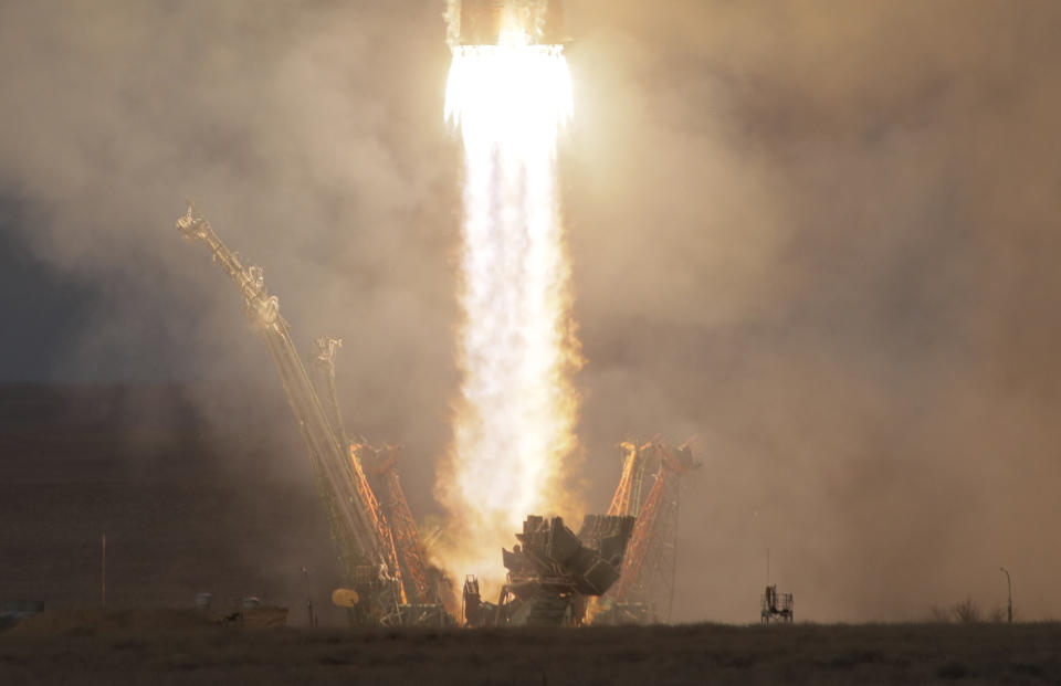 The Soyuz-FG rocket booster with Soyuz MS-11 space ship carrying a new crew to the International Space Station, ISS, blasts off at the Russian leased Baikonur cosmodrome, Kazakhstan, Monday, Dec. 3, 2018. The Russian rocket carries U.S. astronaut Anne McClain, Russian cosmonaut Oleg Kononenko‎ and CSA astronaut David Saint Jacques. (AP Photo/Dmitri Lovetsky)