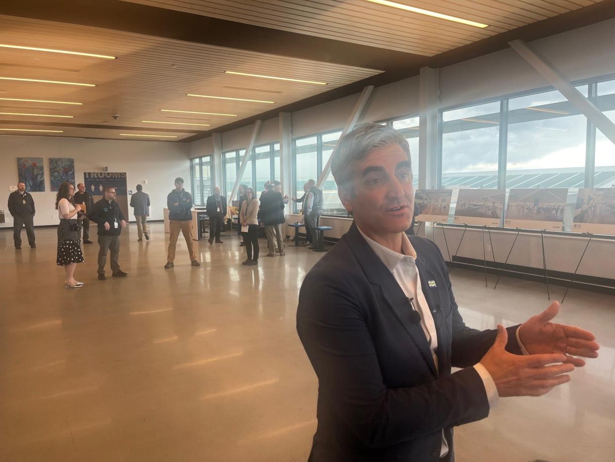 Mayor Miro Weinberger talks to reporters about the Cherry Street shelter following a press conference at Patrick Leahy Burlington International Airport on March 20, 2024.