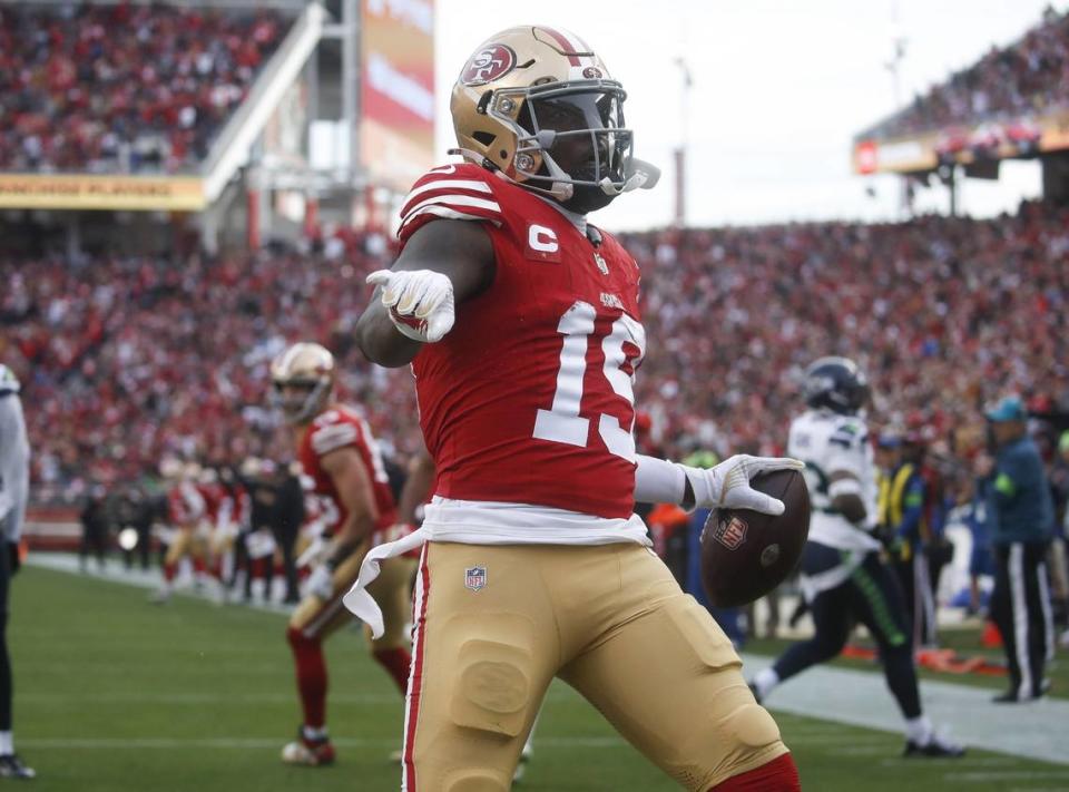 San Francisco 49ers wide receiver Deebo Samuel (19) celebrates his touchdown against the Seattle Seahawks in the third quarter at Levi’s Stadium in Santa Clara, California, on Dec. 10, 2023. (Nhat V. Meyer/Bay Area News Group/TNS) Nhat V. Meyer/TNS