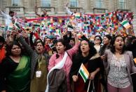 Pro-Modi demontrators shout slogans opposite Downing Street during India's Prime Minister Narendra Modi's official visit, in London, November 12, 2015. REUTERS/Suzanne Plunkett