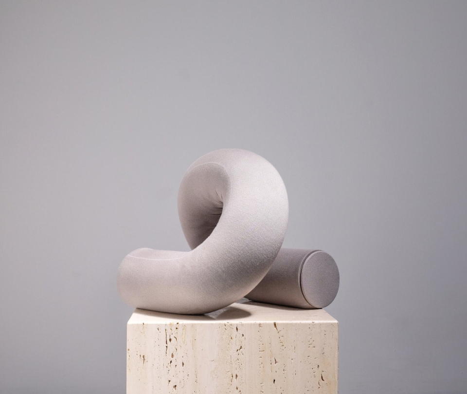 Curving UN stool featured in Ara Thorose's Soft Cylinders series.