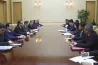 Yun Jong Ho, fourth right, North Korean external economic relations minister, and Oleg Kozhemyako, third left, governor of the Primorye region in the Russian Far East, hold a talk at the Mansudae Assembly Hall in Pyongyang, on Tuesday, Dec. 12, 2023. Senior North Korean economic officials met with the governor of a Russian region along the Pacific coast for discussions on boosting economic cooperation between the countries, North Korean state media said Wednesday.(AP Photo/Cha Song Ho)